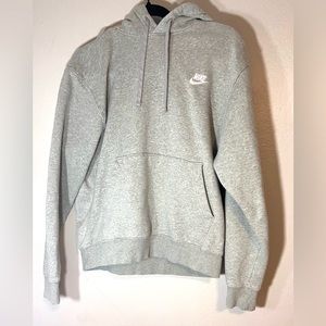 Nike pull over hoodie. Gray with white logo. Size Medium